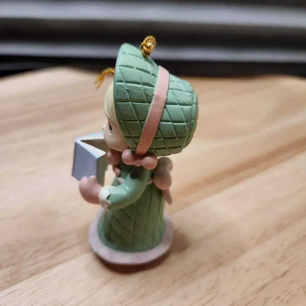 1995 Precious Moments girl singing from song book ornament